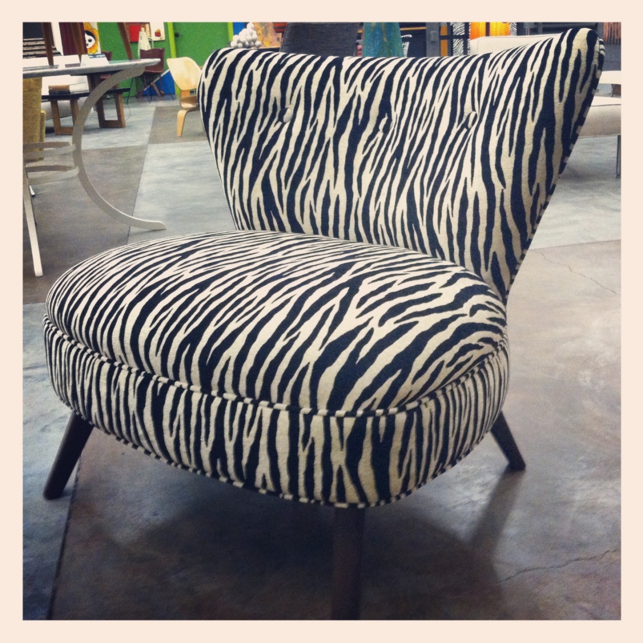 We all have those spaces; a room we adore but something is just missing.  This fabulous vintage armless chair is the perfect addition to brighten any space. Clean lines, stand out print and incredibly comfortable.  What more could you ask for? 1960&#8217;s vintage armless chair.