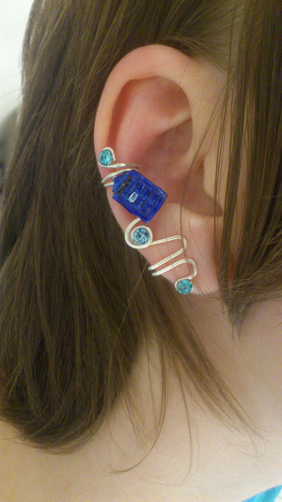 (via Doctor Who TARDIS Ear Cuff by 77Flower77 on Etsy)