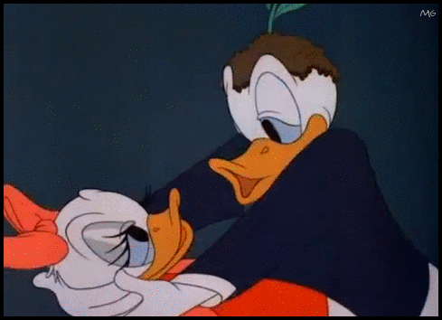 
Daisy and Donald Duck smooch in “Donald’s Dilemma” (1947) - Walt Disney
