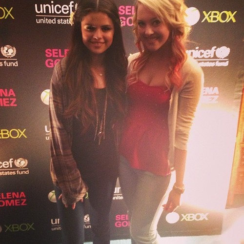 Selena with a fan at her Unicef concert M&G