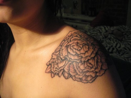 loosegoose: New tattoo. Carnation were my grandma's favorite flower.