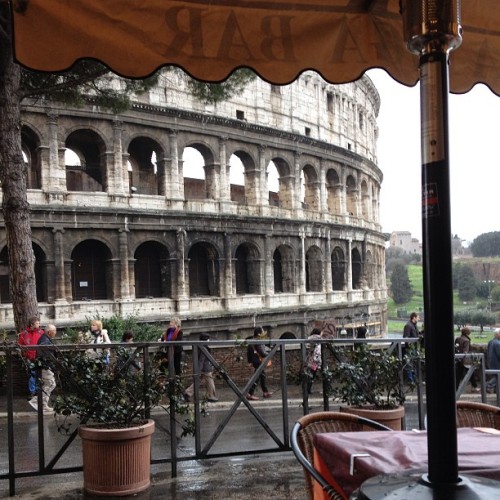 Shelter from the rain, cup of espresso, and a view of the Colosseum. What an afternoon!