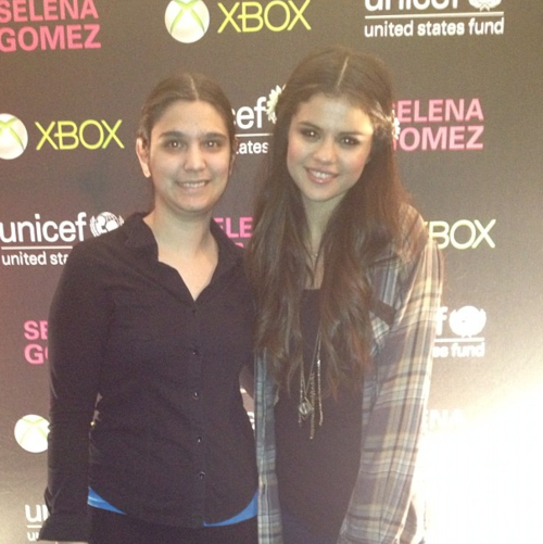 Selena with a another fan at her Unicef concert M&amp;G