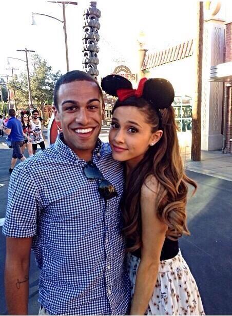 Ariana at DisneyLand today with a fan.