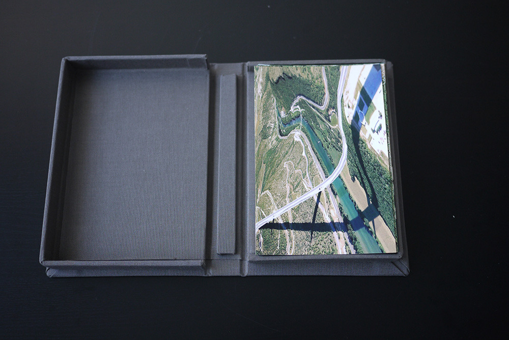 Valla, Clement. Postcards from Google Earth.
2010, 25 cards in box. (on loan from artist)