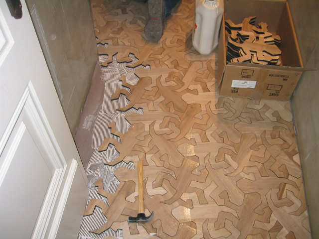 (via MC Escher Inspired Interlocking Wooden Floor Lizards | Geekologie)