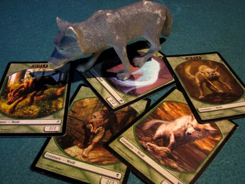 Magic: the Gathering - Tokens !
Use an actual wolf kiddy toy to represent a Wolf Token in your next game. 
To escalate this, you may wish to use real Wolves.