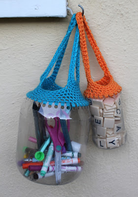 storagegeek:

Recycling containers with crochet&#160;: Filth Wizadry
Repurpose a plastic container with a hole punch and your crochet skills. One of these days, I am going to learn how to crochet! Get the full how to over at Filth Wizadry.

&#8212;
Wow, I definitely want to try these!!