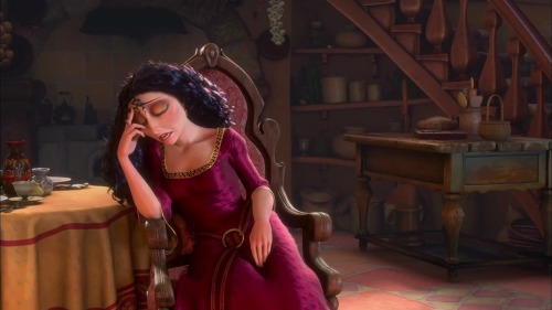 disneymoviesandfacts:

Gothel’s dress is from the Renaissance, which is 400 years before the time period of when the film takes place in the 1780s. This was in an effort to emphasis how Gothel and Rapunzel don’t match up and how long Gothel had been living.
