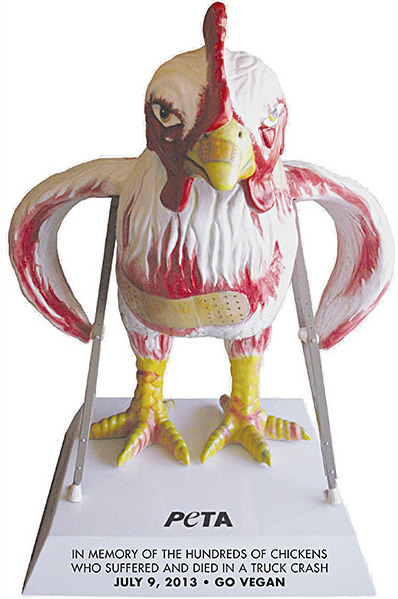 (via PETA Injured Chicken Statue - Neatorama)