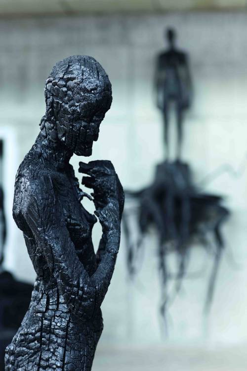 Charcoal sculptures by Aron Demetz