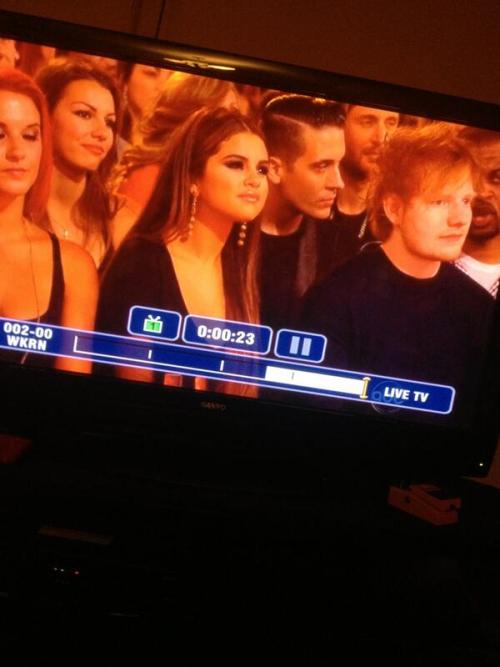 Selena Gomez sitting next to Ed Sheeran at the BBMAs