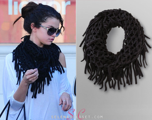 Before Selena Gomez stunned at the red carpet at the Golden Globes afterparty, she got &#8216;papped&#8217; leaving a CVS earlier that day wearing this Dream Out Loud Lattice Infinity Scarf in black. Its finally available on kmart.com and you can get it for $11.99. <br /> Buy it HERE <br /> Thanks @julia_cangonji1! <br /> She wore this scarf with 291 pants, Vince Camuto boots, and her Dolce &amp; Gabanna bag. We are looking for her top.