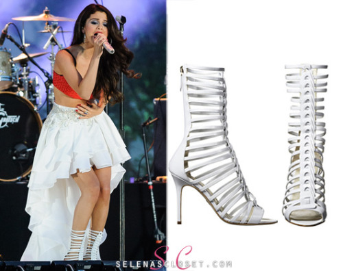 selenascloset:Selena Gomez’s shoe game was ON POINT today when she performed at Macy’s 4th of July Event in NYC. She worked the stage in these fierce White Leather Brian Atwood Isabeli Gladiator Sandals. You can find them on sale on Brian Atwood’s website for $969.Buy them HEREShe’s also wearing a Dolce & Gabbana top. We’re looking for her skirt.