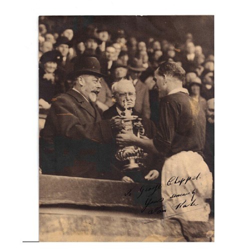 niteskolar:

Photo of Arsenal captain Room Parker receiving 1930 #FACup from King George V in 2-0 won over Huddersfield Town. (Source: Doug Rogers) #Arsenal #Gunners
