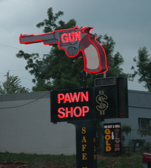 Pawn shop advertising guns
