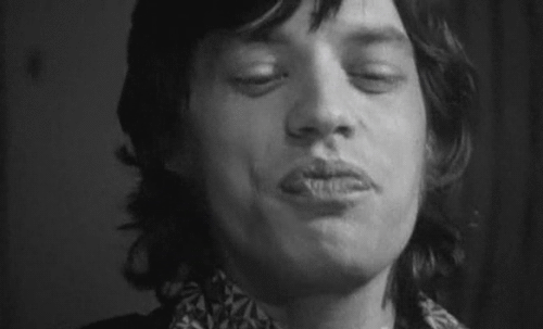 Image result for mick jagger laughing gif