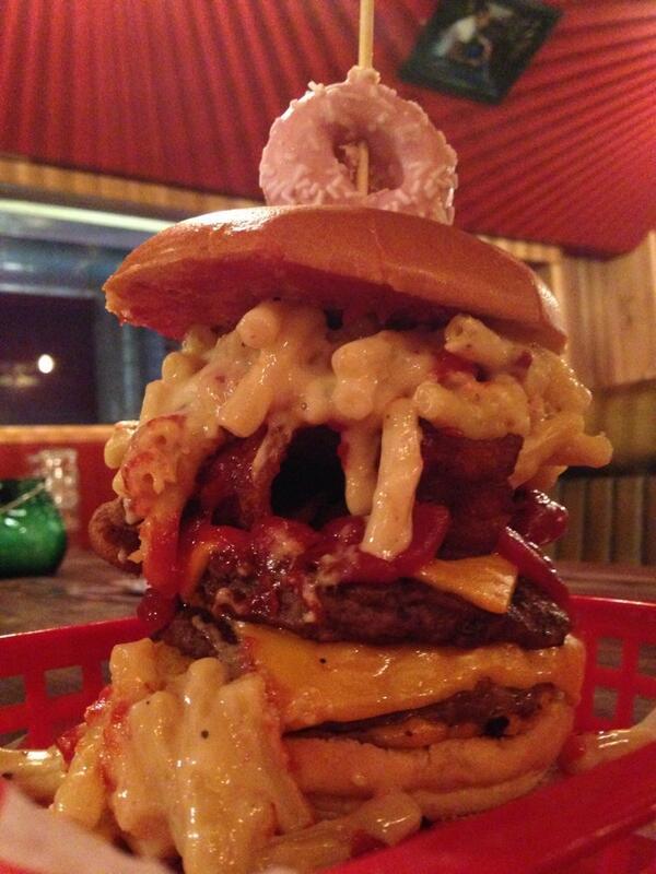 everybody-loves-to-eat:

mac, cheese, donut, onion rings and bacon burger. 