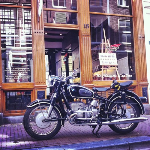 Sunday ride. Black Beauty 1967 BMW motorcycle in front of the Red Wing ...