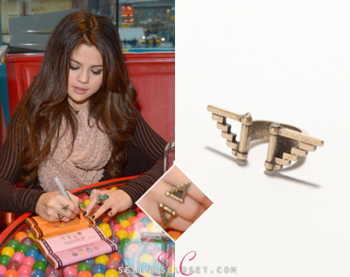 Selena Gomez held a Unicef Dessert Party at Dylan&#8217;s Candy Bar in NY over the weekend. She wore a With Love From CA Pyramid Ring in color Antique Gold. You can purchase this ring from Pacsun.com for a hot $8.50! <br /> Buy it HERE  <br /> She&#8217;s also wearing a Free People top. We&#8217;re still looking for her scarf and other ring.