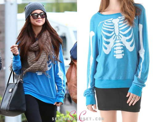Selena Gomez was &#8216;papped&#8217; today on a shopping spree with friend Francia Raisa, wearing a Wildfox Couture Inside Out Baggy Beach Sweatshirt in color Cerulean. This sweatshirt is sold out in most stores, however DollsKill.com has it on clearance for $63.00. <br /> Buy it HERE. <br /> She&#8217;s also wearing Westward Leaning sunglasses, Fergie boots, Urban Outfitters scarf and carrying her Dolce and Gabbana handbag.