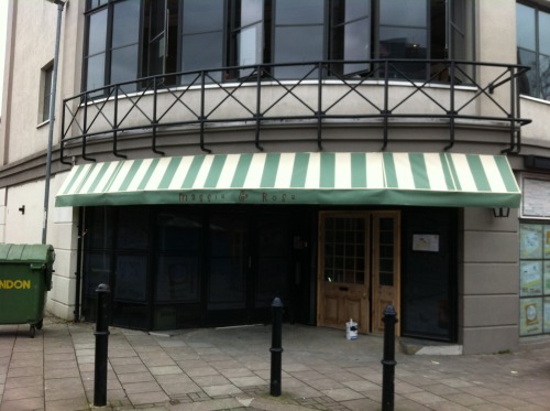 Fixed shaped awning at Maggie &amp; Rose in Chiswick High Road.