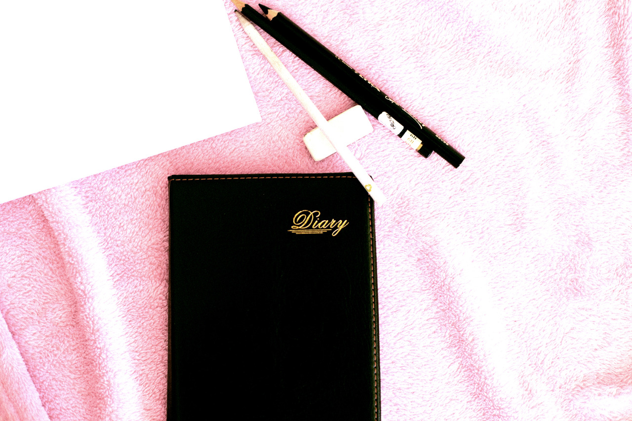 Diary &amp; pink blanket. 