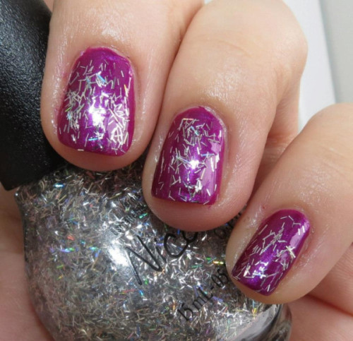 

Selena Gomez&#8217; &#8220;Pretty In Plum&#8221; with &#8220;Stars at Night&#8221; on top, from her Nicole by OPI Nail Polish Collection!

