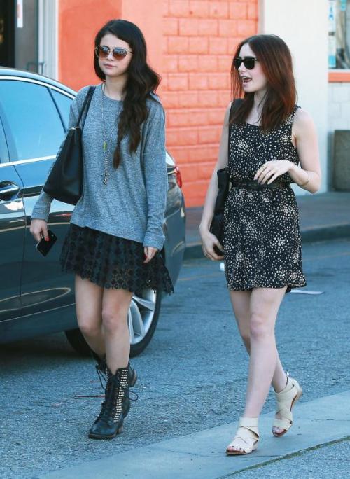 (more) Beautiful ‘Spring Breakers’ actress Selena Gomez met with Lily Collins wearing black studded boots, frilly black dress and heart sunglasses at Sushi Dan in Studio City, California on February 12, 2013.
