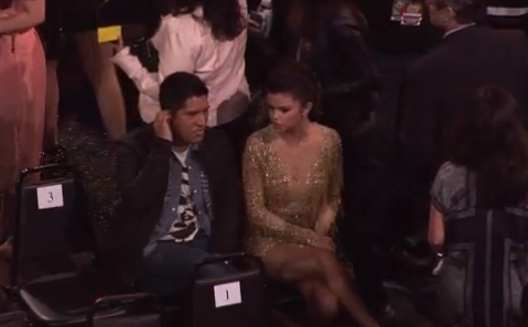 Selena sitting next to Gweny inside!