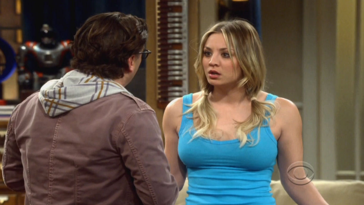 Kaley Cuoco in a tight blue tank top showing a hint of her hard right nipple