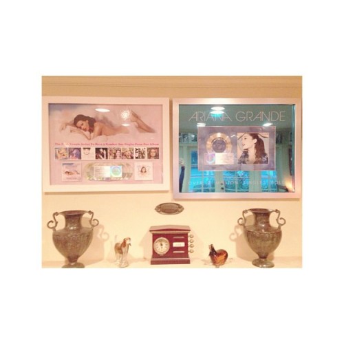 @arianagrande: Favorite thing ever. Me &amp; @KatyPerry&#8217;s plaques next to each other at out voice teacher Eric&#8217;s house. Still can&#8217;t even believe I have one of those. :)