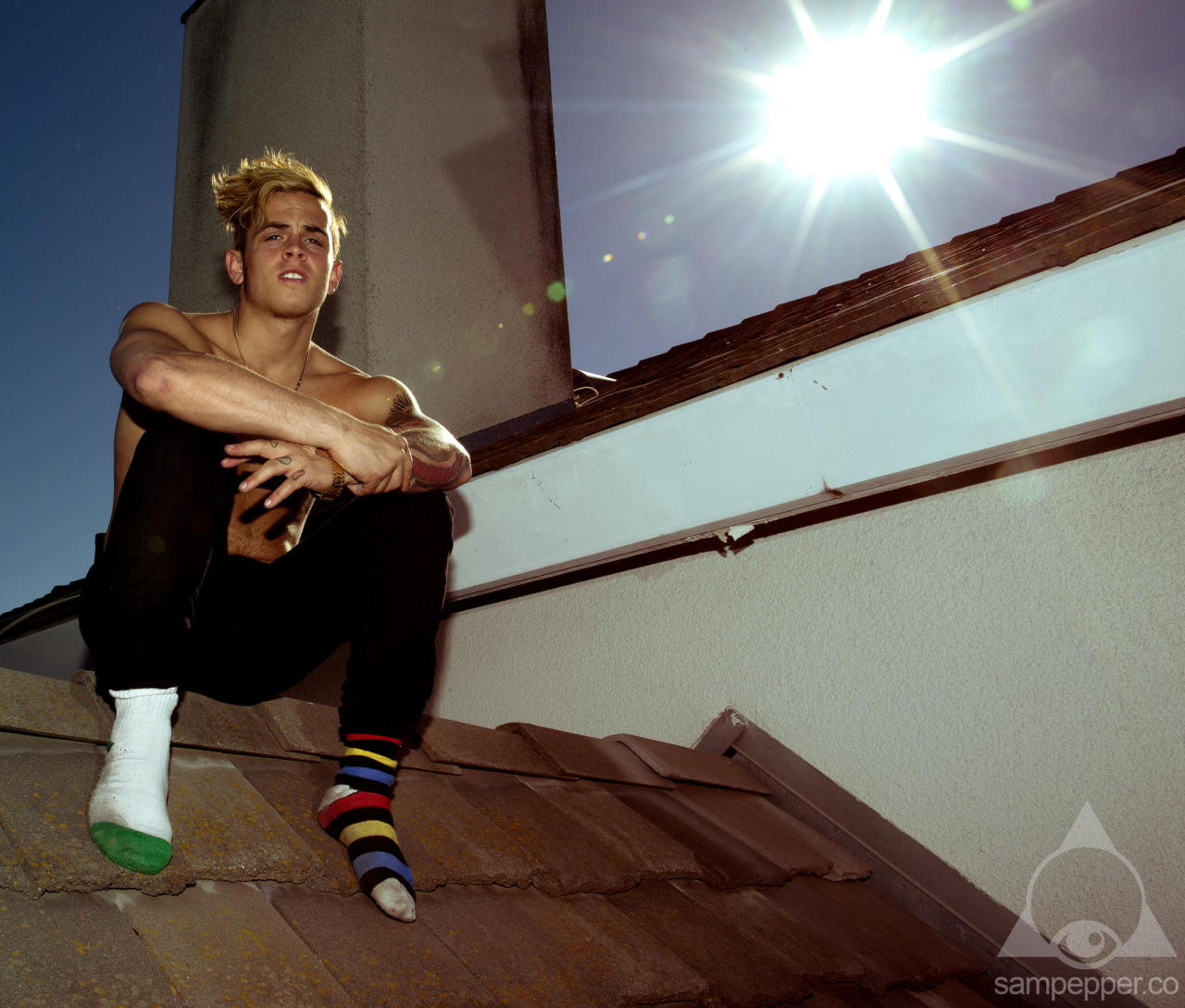 Daniel Sahyounie of the Janoskians on top of a roof in LA!
I love his odd socks in this photo :)  