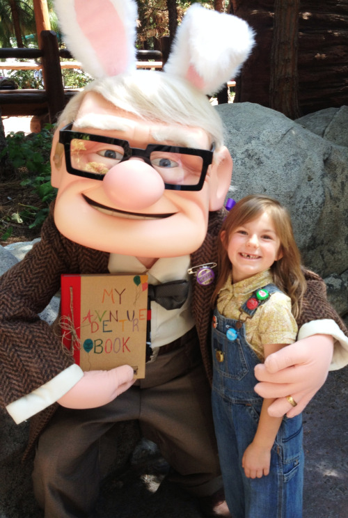 Carl Fredricksen and young Ellie after browsing through their adventure book.
