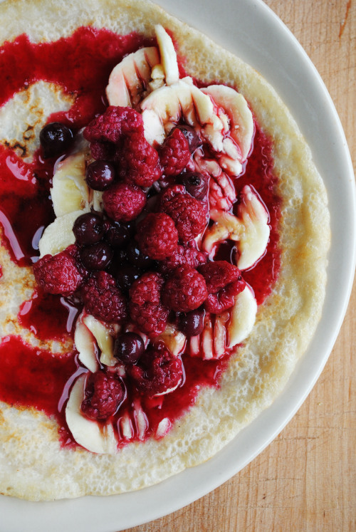 vegansandra:

Another pancake post. Ate this beautiful thing with bananas and home made berry compote today for breakfast. It tasted like summer!
