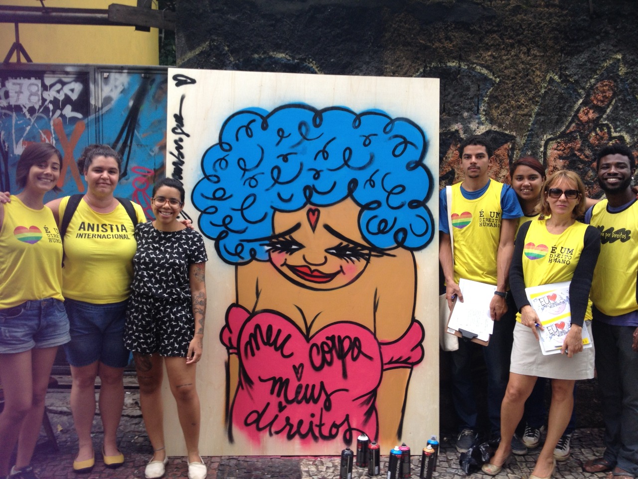 Graffiti artist Negahamburguer join the launch of #MBMR in an AI Brazil action during International Women&#8217;s Day at the traditional neighborhood of Lapa - Rio de Janeiro. Activists collected signs for petition and distributed tatoos.