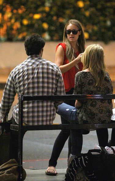 'The Hills' reality TV stars Lauren Conrad and Lauren &#8220;Lo&#8221; Bosworth arrive to Los Angeles International airport (LAX) They chat with friends while waiting to catch their shuttle to leave.  October 5, 2009