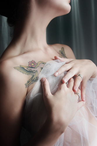 From the collarbone tattoo series, with the pale, white, tulle twist.