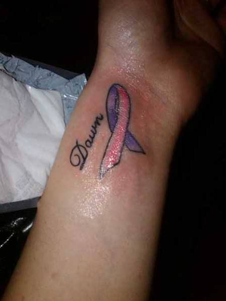 breast cancer ribbon tattoo. My very first tattoo.