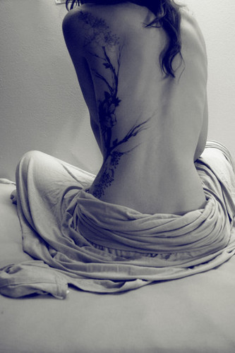 Tattoos between the ribs