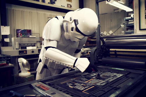 Photo of the Day: Stormtrooper using a letterpress.  This isn’t the typeface you’re looking for, etc. [macelodeon.]