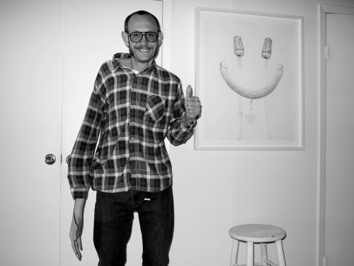Terry Richardson in front of his Aurel Schmidt drawing at his studio, Bowery, New York. Photo Olivier Zahm
