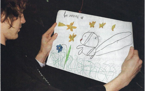 mindgames-:

“This little girl was sitting directly in front of me the whole show- she had that stunned expression on her face the entire time. I found her very patient and open to new ideas. She gave me that picture- I’m just glad someone that age knows what paper even is.”-Andrew VanWyngarden

(via siberianbreaks)