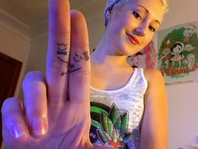 I needed some cheering up this week so I figured adorable finger tattoos 