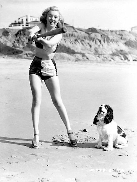 Marilyn Monroe and a cute four footed friend at the beach C Late 1940s