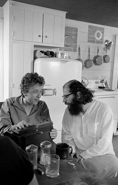 Bob Dylan and Allen Ginsberg inside the kitchen of Dylan’s Woodstock home in 1964
via