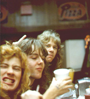 Young Dave Mustaine Lars Ulrich James Hetfield eating pizza