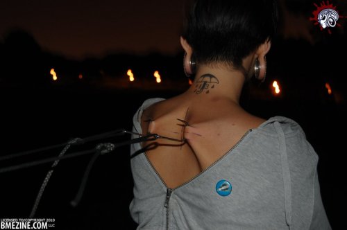  modification temporary stretched ears neck nape tattoo | 14 notes