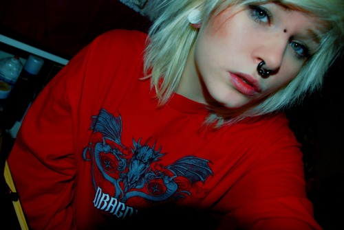Piercings Shown: Septum, Earl and stretched ear.