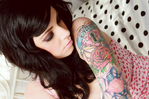 half sleeve tattoo girl. with half sleeve tattoos.